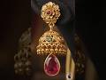 Flawless handcrafted gold work and intricate peacock motifs stunning combination of red rubies