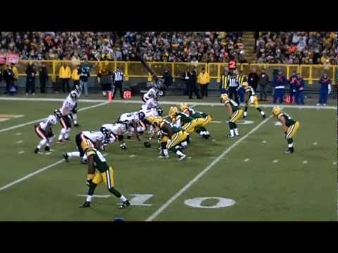 Aaron Rodgers connects with James Jones for a TD in the left end zone while taking on the Chicago Bears Christmas Night during Sunday Night Football from Lambeau Field in Green Bay, WI. The Packers victory secured them home field advantage throughout the playoffs. The Packers record entering the final week of play is 14-1.