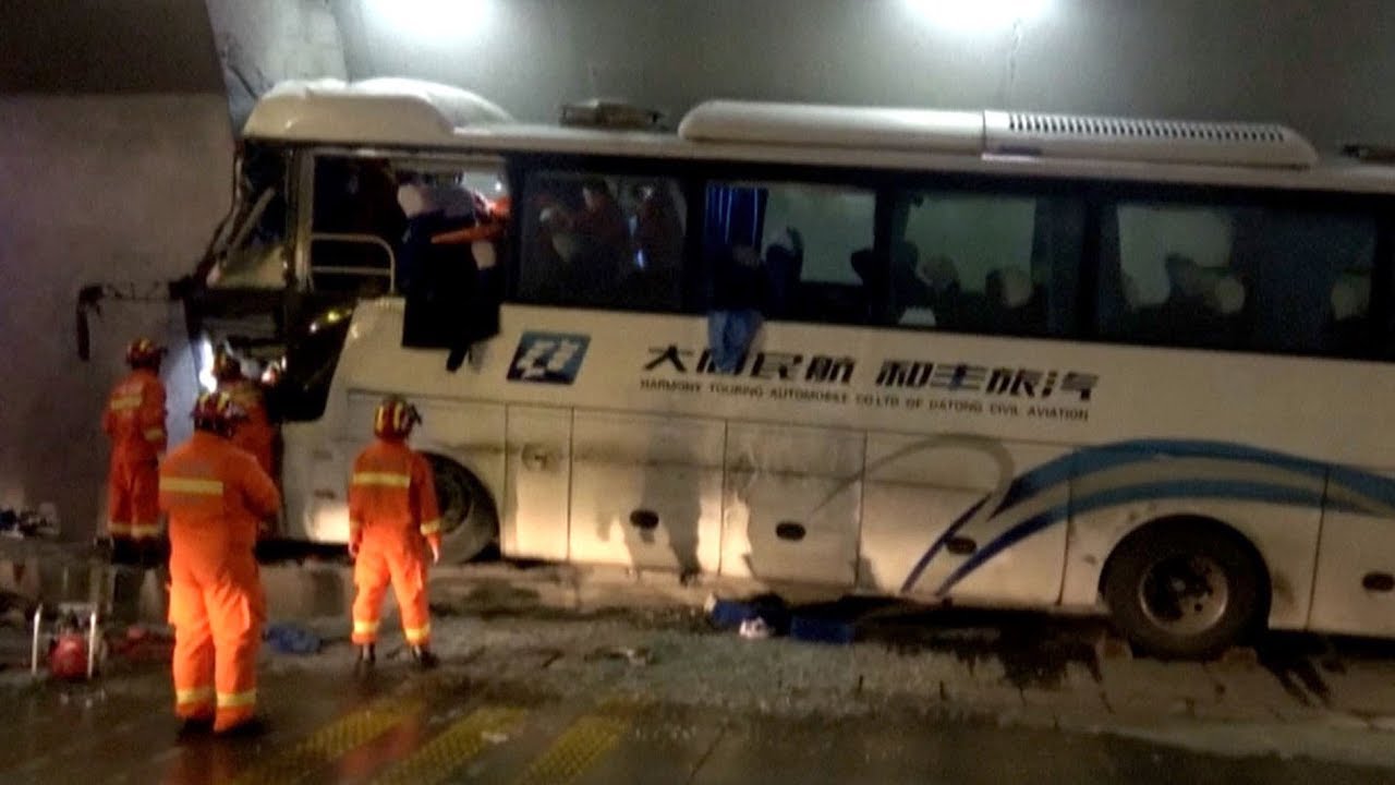 Four dead after bus crashes into tunnel wall in S China