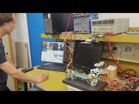 Robotic arm and conveyor controlled by PC  with image processing.