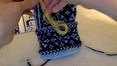 Put thumb stitches on scrap yarn