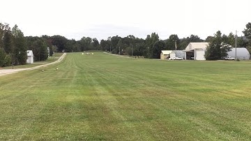Twin Comanche taking off