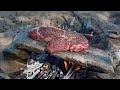 Primitive Technology - Cooking Steak on a Rock