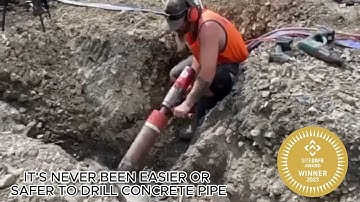 Drilling through concrete pipe with ease with the Core Drill Block.  www.coredrillblocks.com