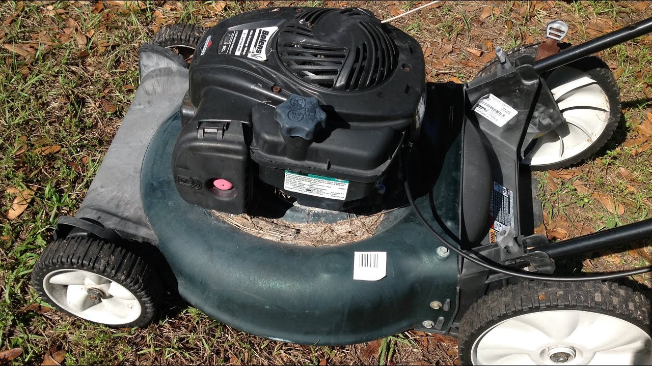 Bolens walk behind mower from the side of the road. YouTube