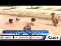 Children Enjoying Taking Bath In Canal Children Enjoying Taking Bath In Canal