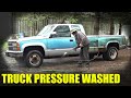 Pressure Washing A Dirty Truck