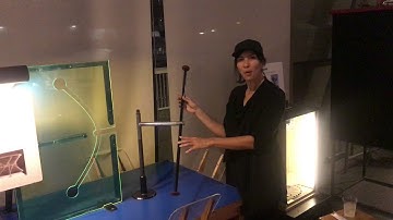 Straight rod passing though a curved hole! (Hyperbolic slot)