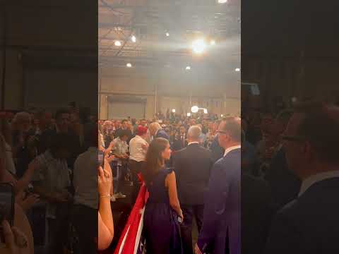 President Trump exits the stage in the middle of his speech to embrace parents who lost their child
