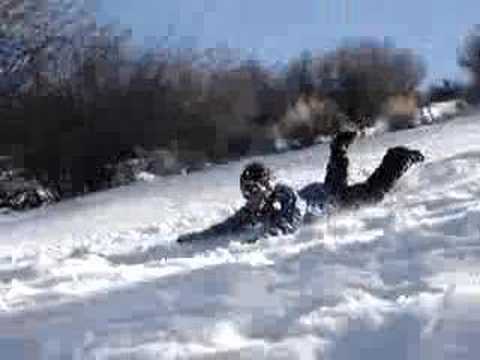 Crazy "hobo-style" snow sledding