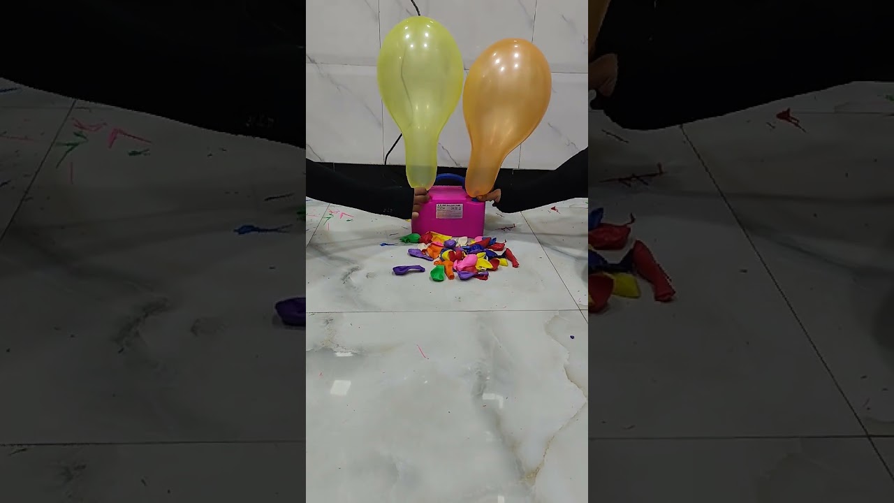 Yellow and orange balloon burst 
