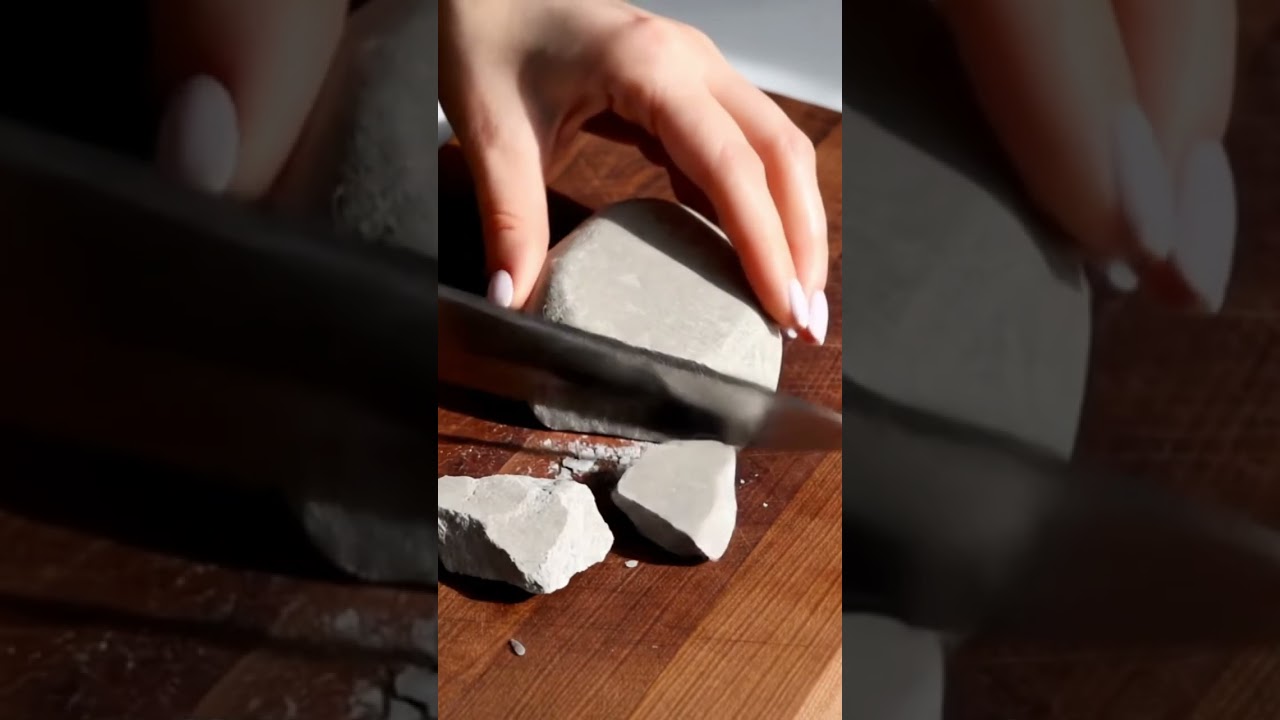 Satisfying knife cutting into a rock like butter. Real or AI? 