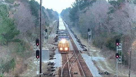 CSX Auto Rack Train Coming And Going From On Top Of A Bridge