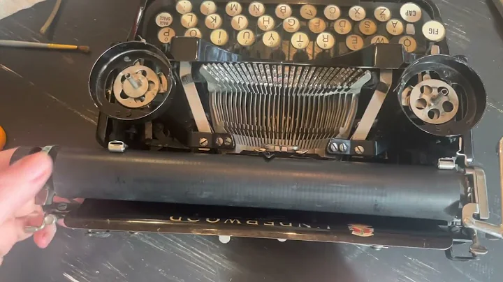 Reattaching the Typewriter Draw Band to the Main Spring of an Underwood Portable Three Bank