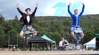 Great Highland Fling performance by competitors at Kenmore Highland Games in Perthshire, Scotland