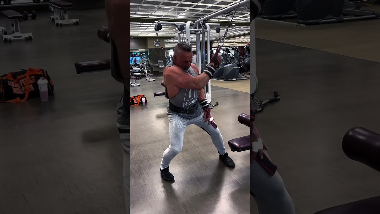 One arm sideways standing pulldowns, using your power straps as handles is a great way to isolate