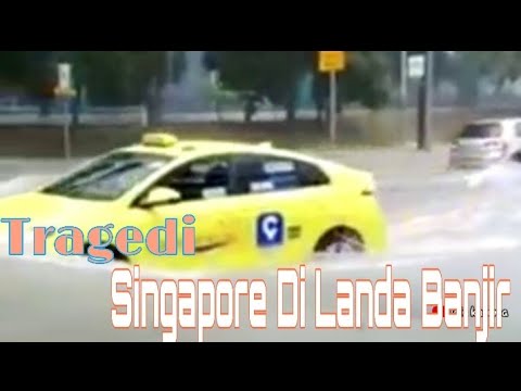 Flash floods reported in parts of Singapore after heavy rain - YouTube