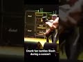 Drunk moron tackles Slash during a concert #music #gunsnroses #shorts