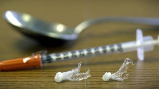Addiction in America: Don't jail opioid abusers?