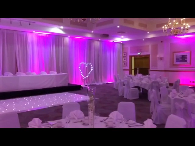 White wall drapes with up-lighting, led dance floor and light up dance floor