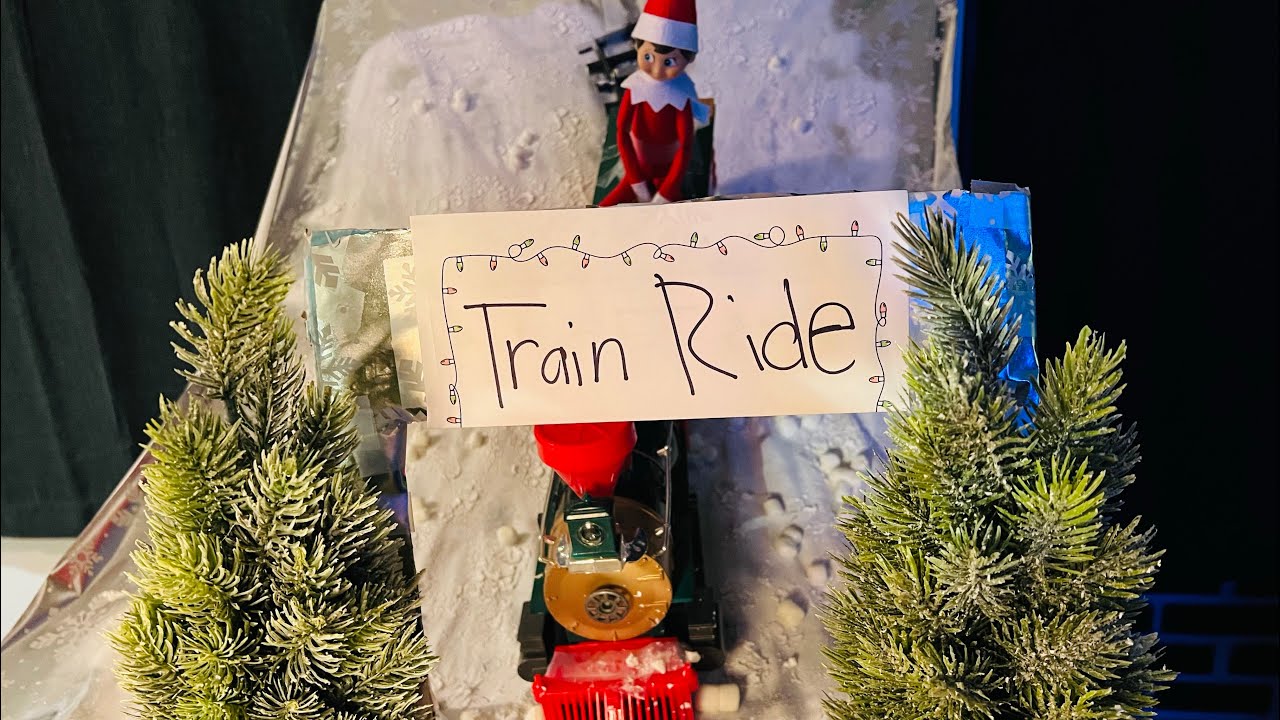 Elf on the shelf Day 4! Elf builds his own train ride unboxing our