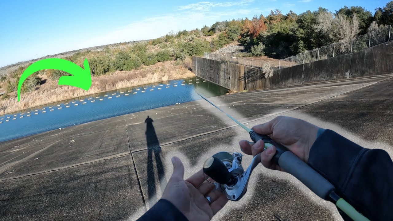 Bass fishing the DANGEROUS spillway with what?