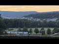 Swiss train glides through the sunset