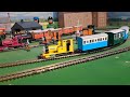 Bachmann Yellow Rheneas Pulling green , 2 blue coaches and blue box van
