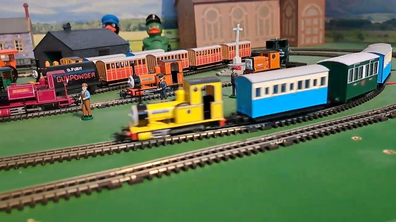 Bachmann Yellow Rheneas Pulling green , 2 blue coaches and blue