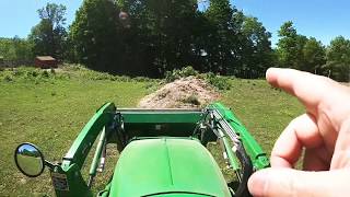 Turning the compost pile
