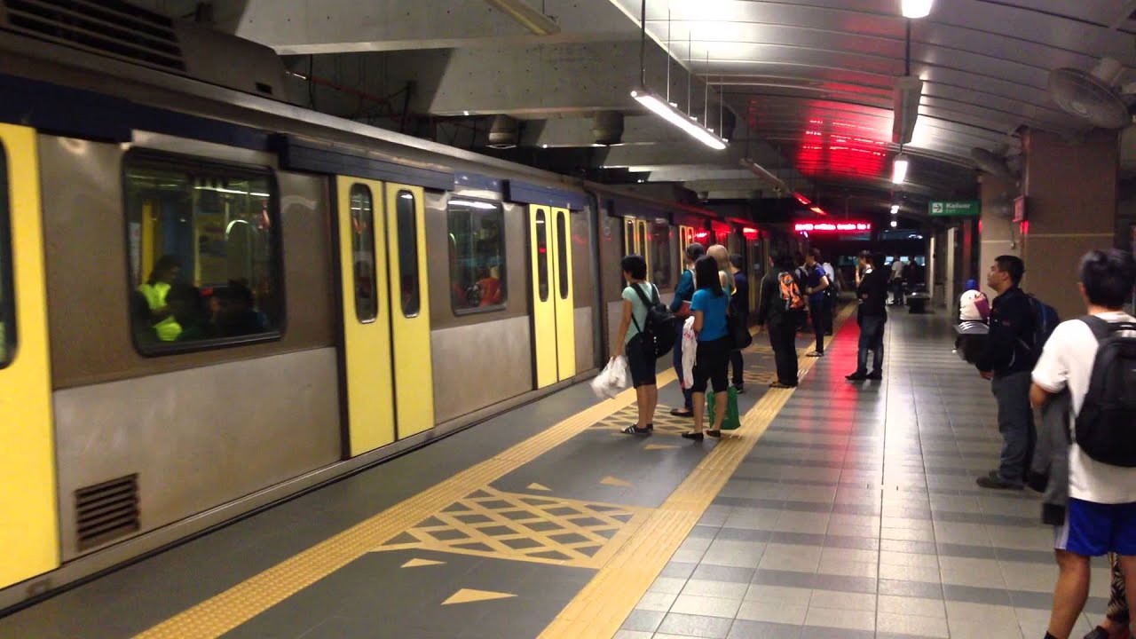Arrival train Star Line LRT Rapid KL at night Plaza Rakyat ...
