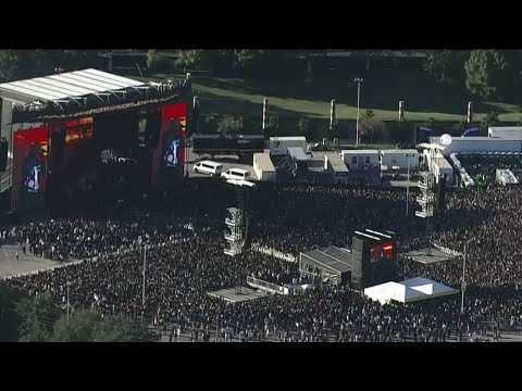 Earlier video shows crowd rushing through gates at Astroworld Festival