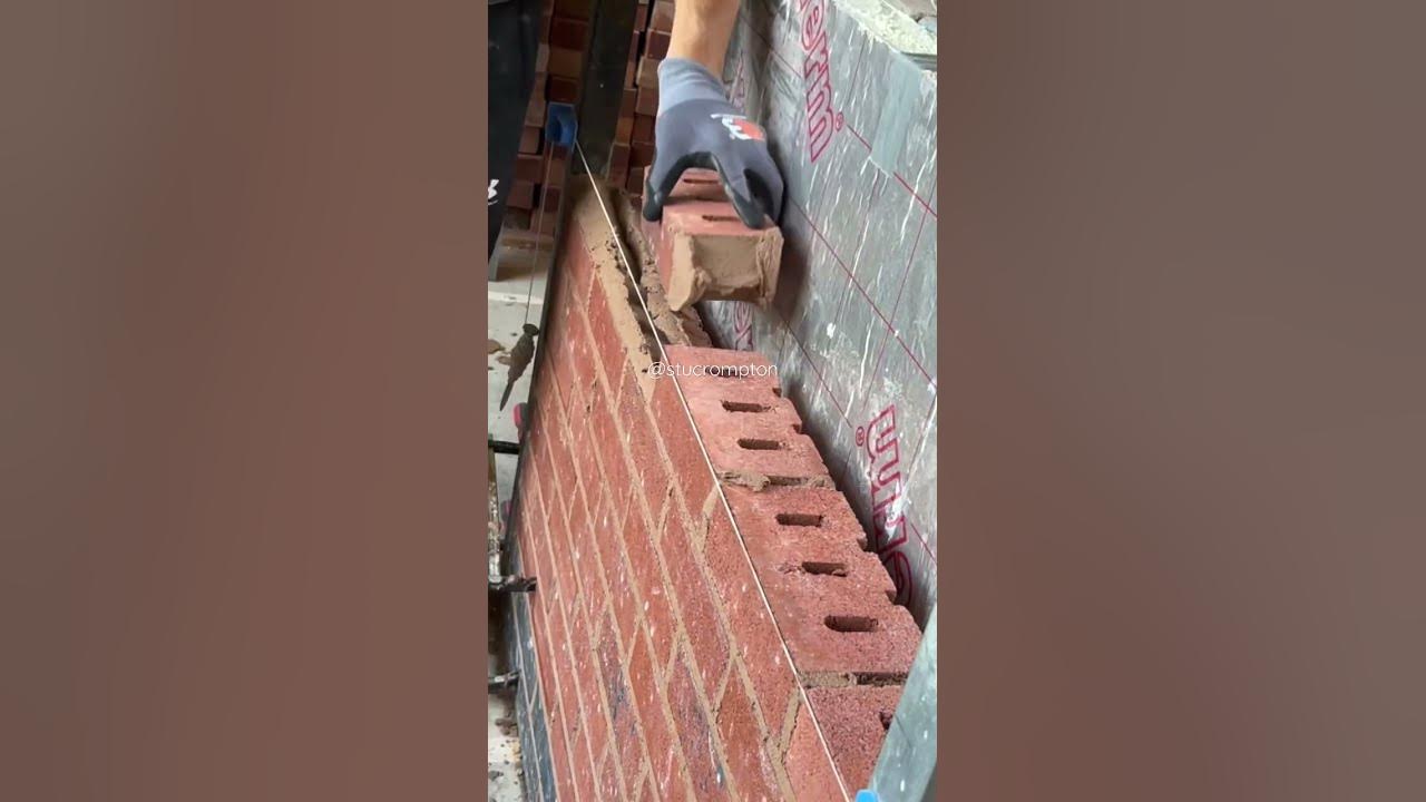 Laying bricks to a string line bricklaying youtube youtubeshorts 