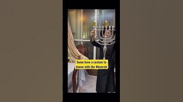 Rav Meilech Biderman dances with his Menorah #shorts #chanukah #rabbi #livinglchaim