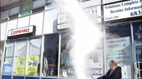 Boiling water freezing before hitting the ground!