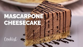 Ingredients 200g biscuits 100g butter, melted chocolate 40g butter
30ml rum 30g cocoa 350g mascarpone cheese sugar 400ml whipped cream
80ml chocola...