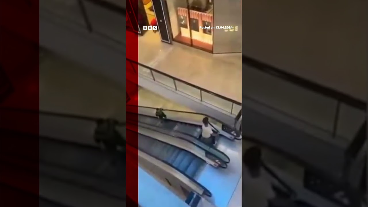 A civilian was filmed confronting a Sydney knifeman on an escalator at a mall.  #Briefs #BBCAnews