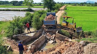 Backfill the damaged canal and drainage system to link the road for farmers’ travel.