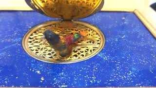 Vintage Reuge singing bird box with clock