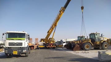caterpillar 966h wheel loader loading with low beds mobile crane Zhang china DebShankar-i8p |