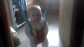 My daughter in her door bouncer