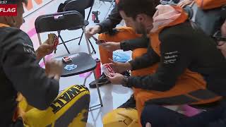 McLaren crew playing Uno during the Japanese GP 2022 screenshot 1