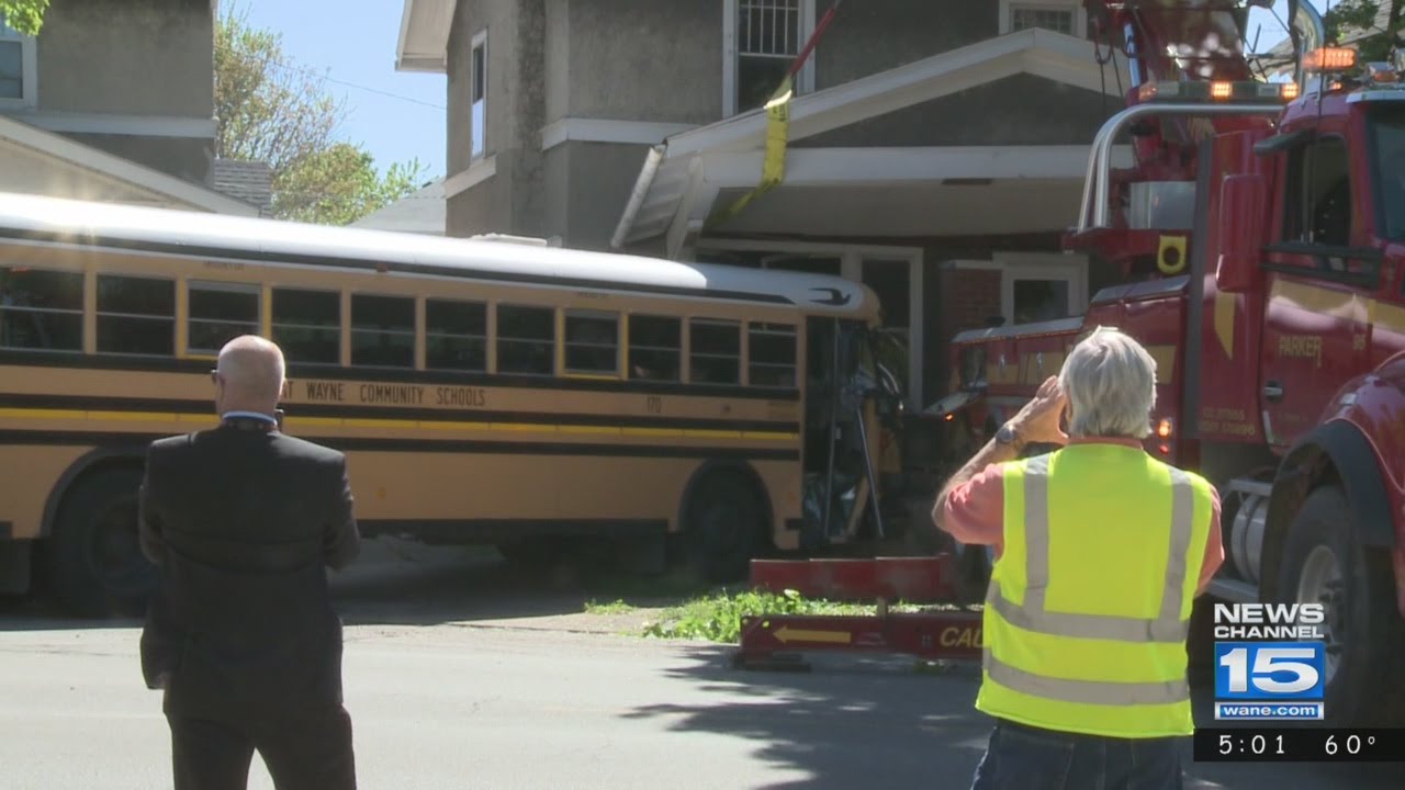 School bus crashes into home - YouTube