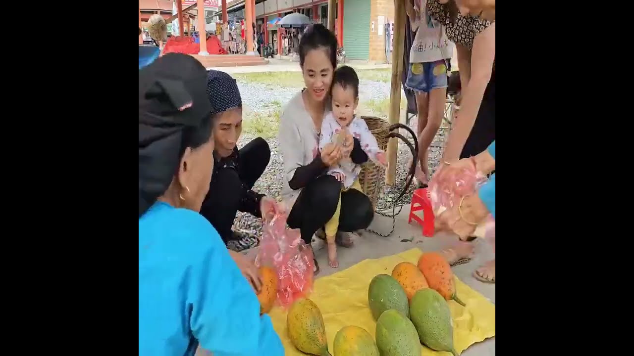 A Mother’s Routine With Her Children in a Growing Bamboo House