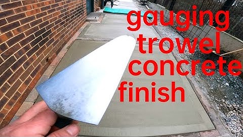 how to use a gauging trowel to get a prefect finish on a concrete slab