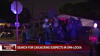 Police search for armed carjacking suspects in Miami-Dade