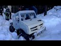 Унимог 6х6 прокладывает путь по снежным заносам -Unimog 6x6 (TRX6) paves the way