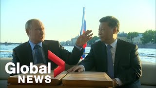 Vladimir Putin, Xi Jinping take a leisurely boat tour together