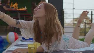 Woman Taking Selfies By The Pool