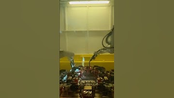 We design and produced 800kg payload three-axis positioner, are pared with a Panasonic welding robot